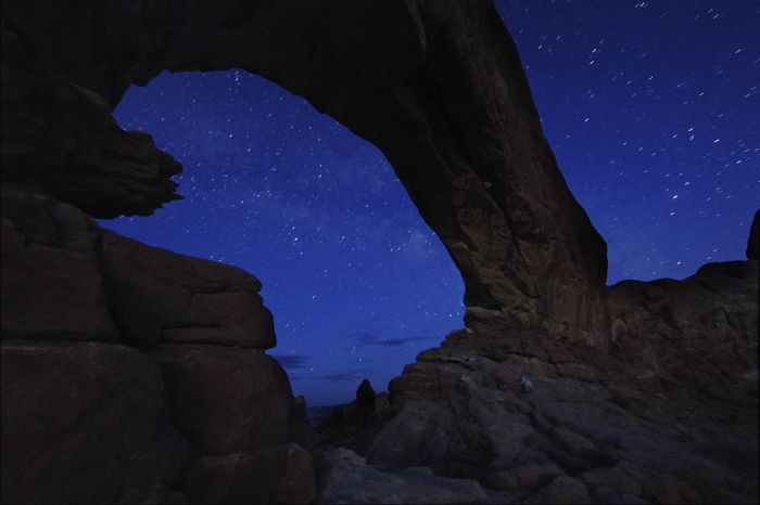 Starry night sky and rock formation, Arches National Park, Utah