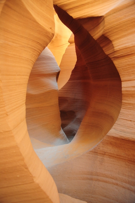 Orangish, curving rock formations in Antelope Canyon, a slot canyon on the Navajo reservation near Page, Arizona